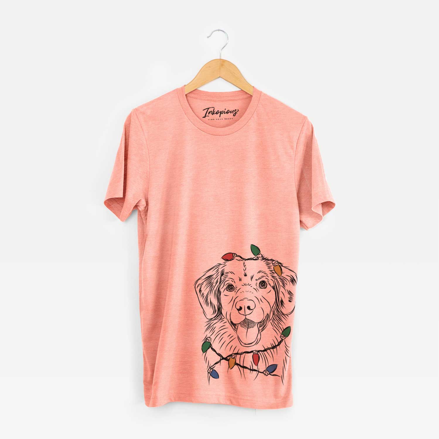 Hand-drawn sketch of Weston the Nova Scotia Duck Tolling Retriever wrapped in Christmas lights on a Sunset Unisex crewneck
