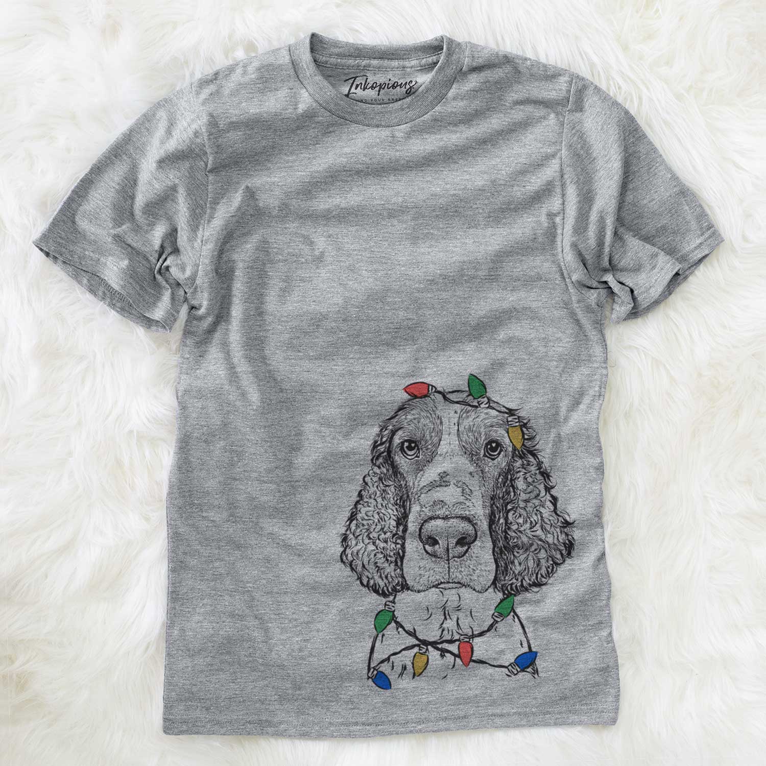 Hand-drawn sketch of Wilbur the English Springer Spaniel wrapped in Christmas lights on a Grey Unisex crewneck
