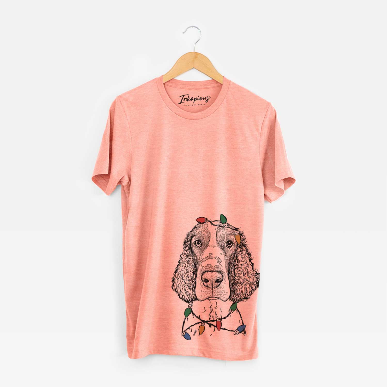 Hand-drawn sketch of Wilbur the English Springer Spaniel wrapped in Christmas lights on a Sunset Unisex crewneck