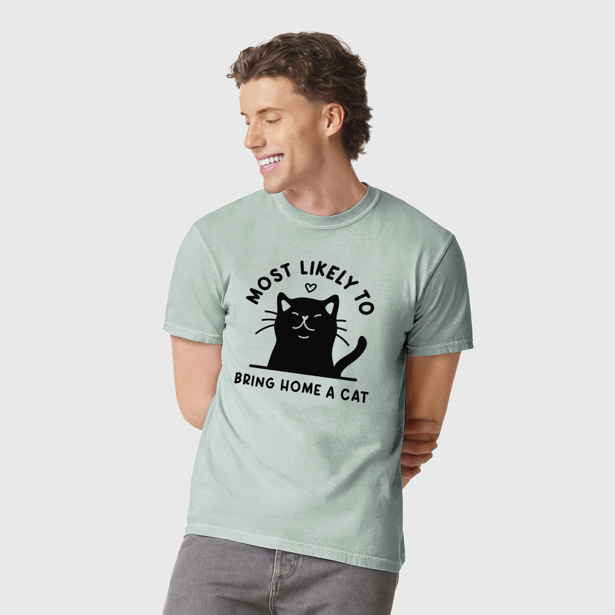Most Likely to Bring Home a Cat - Black - Unisex Comfort Colors Garment-Dyed Heavyweight T-shirt, worn by model
